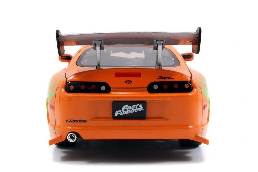 JAD30738 Fast and Furious - 1995 Toyota Supra 1:24 with Brian Hollywood Ride - Jada Toys - Titan Pop Culture