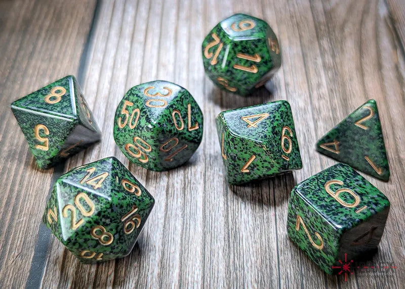 VR-111418 Chessex D7-Die Set Speckled Polyhedral Golden Recon 7-Die Set - Chessex - Titan Pop Culture