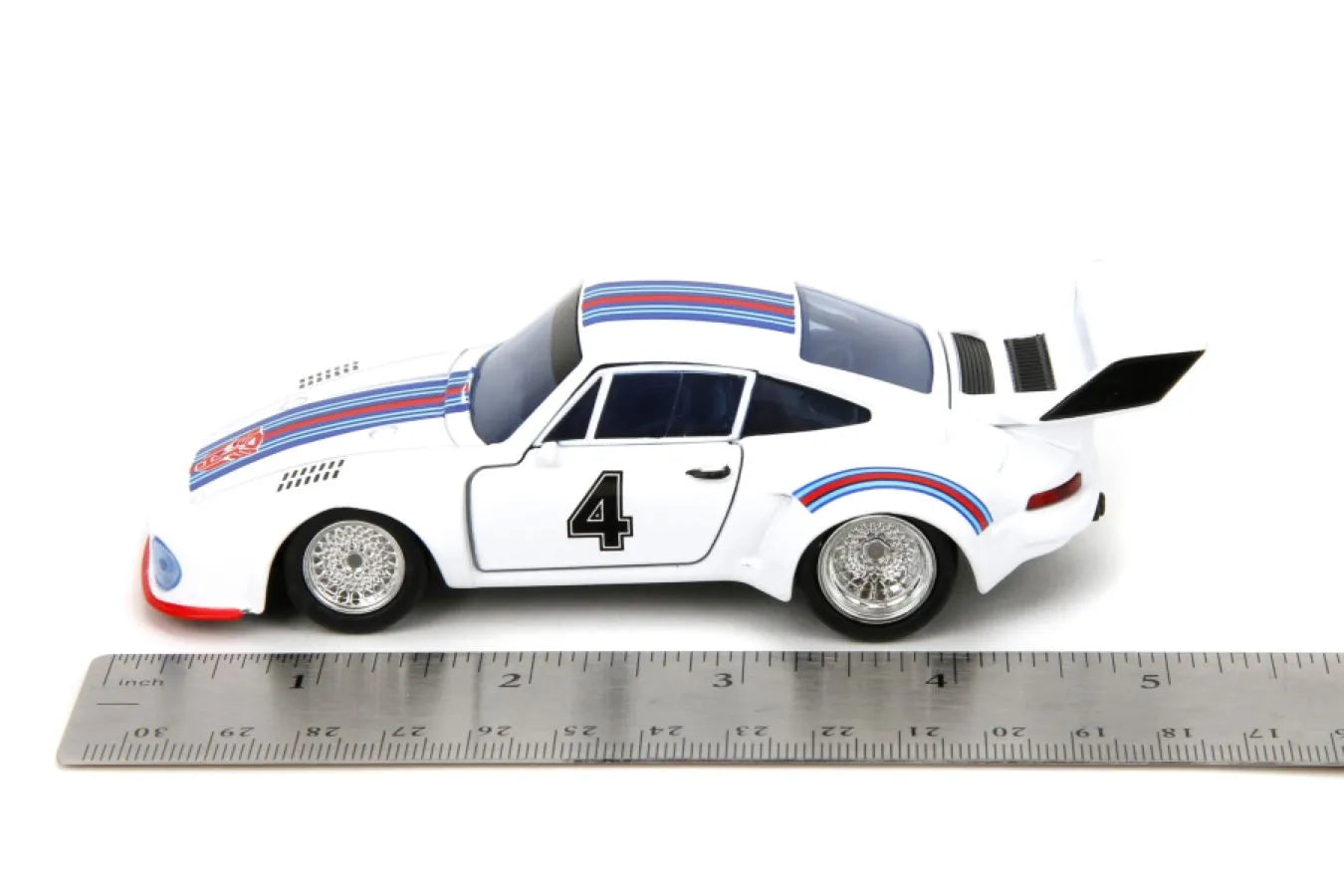 Transformers - G1 Jazz (Porsche 935 de 1976) Vehículo de fundición a escala 1:32