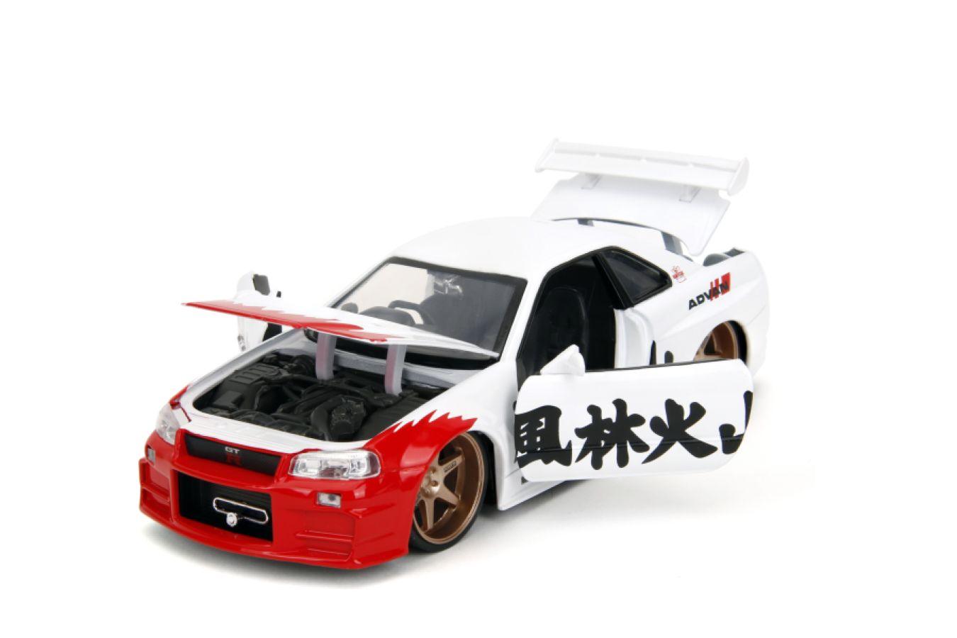 JAD35114 Street Fighter - Nissan Skyline GTR R34 (with Ryu figure) 1:24 Scale Diecast Vehicle Set - Jada Toys - Titan Pop Culture