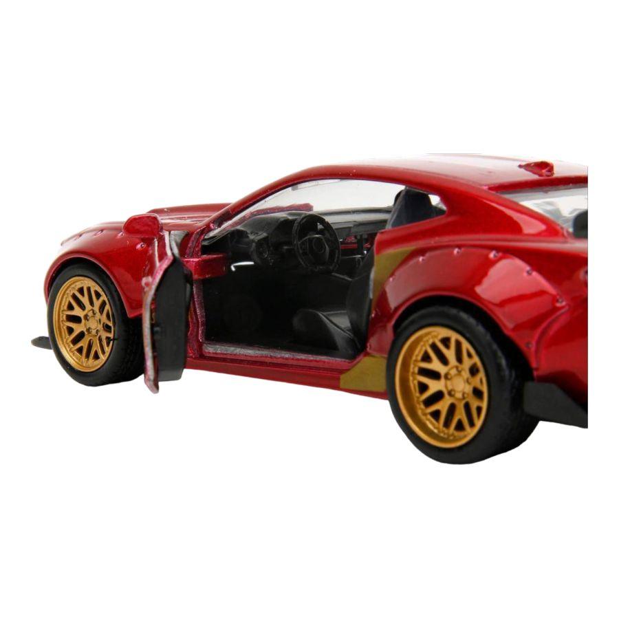 JAD30309 Marvel Comics - 2016 Chevy Camaro SS Widebody with Ironman 1:32 Scale Diecast Figure - Jada Toys - Titan Pop Culture