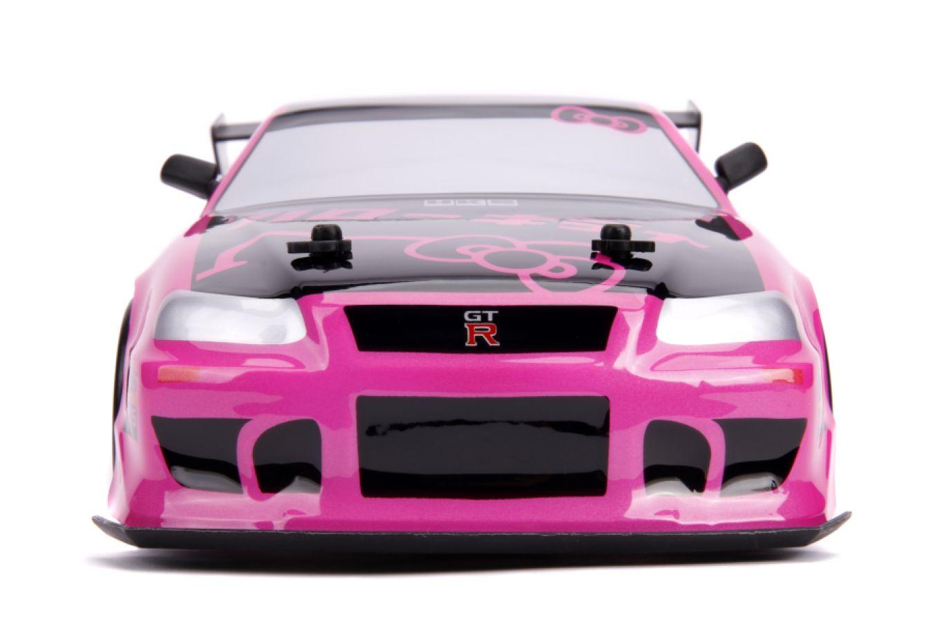 JAD31432 Hello Kitty - 2002 Nissan Skyline GT-R (BNR34) 1:10 Scale Remote Control Car - Jada Toys - Titan Pop Culture