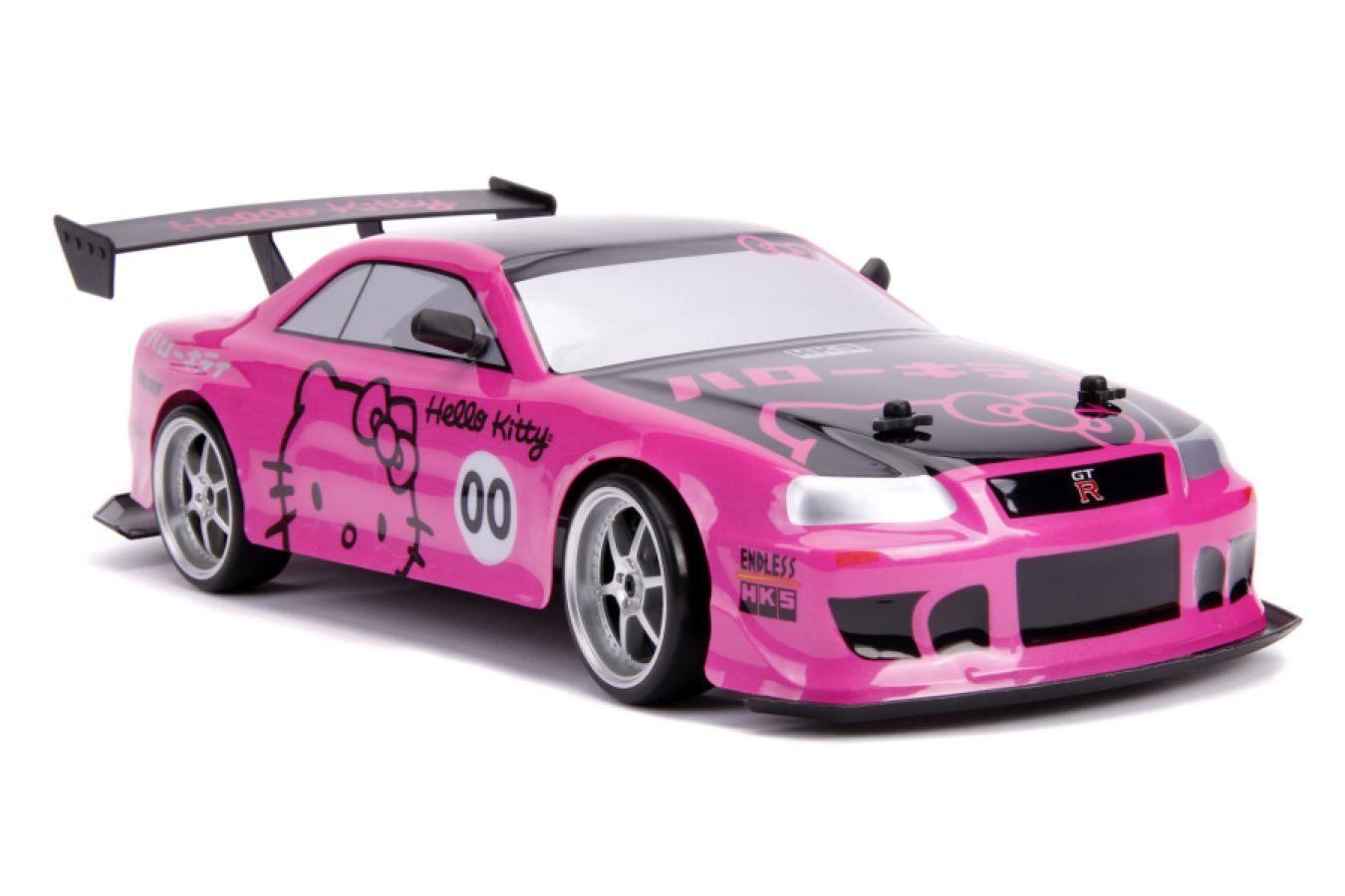 JAD31432 Hello Kitty - 2002 Nissan Skyline GT-R (BNR34) 1:10 Scale Remote Control Car - Jada Toys - Titan Pop Culture