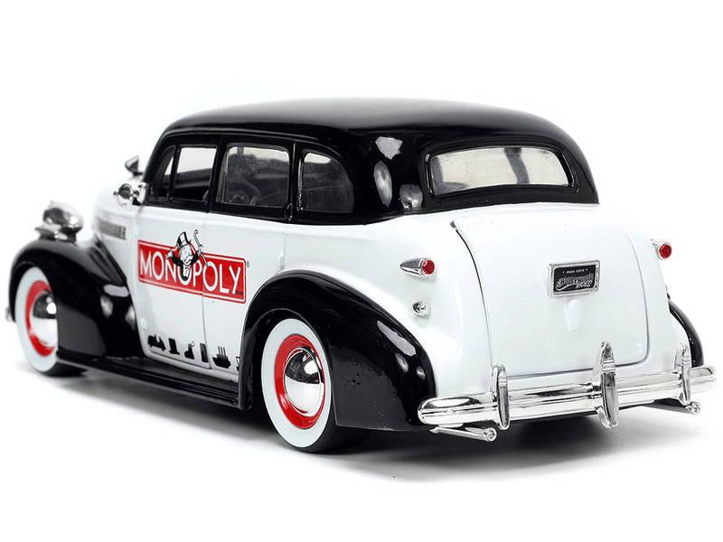 JAD33230 Monopoly - Mr Monopoly & 39 Chevy Master Deluxe 1:24 Scale - Jada Toys - Titan Pop Culture