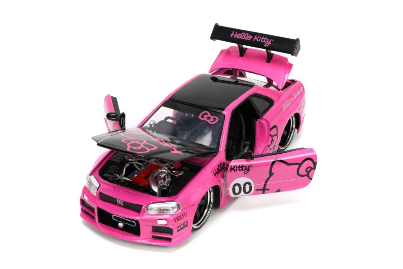 JAD34092 Hello Kitty - 2002 Nissan GTR (R34) with Hello Kitty 1:24 Scale Diecast Vehicle - Jada Toys - Titan Pop Culture