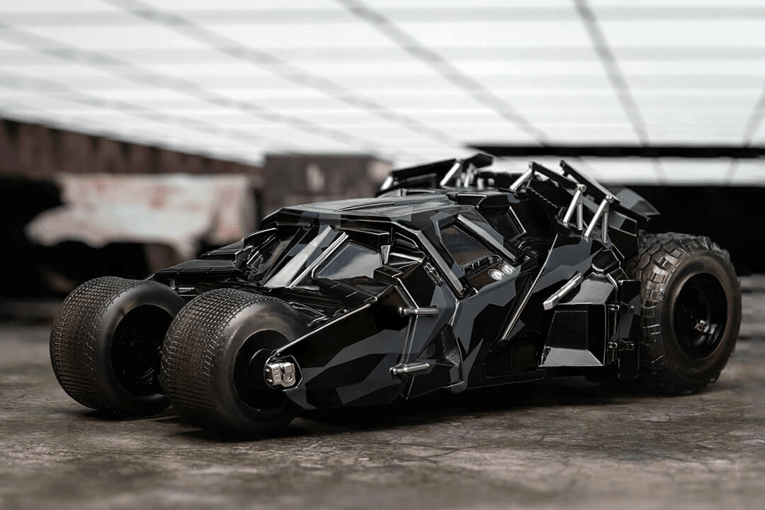 JAD34821 Batman: Dark Knight Trilogy - Batmobile with Batman (Black Camo) SDCC 2023 Exclusive 1:24 Scale - Jada Toys - Titan Pop Culture