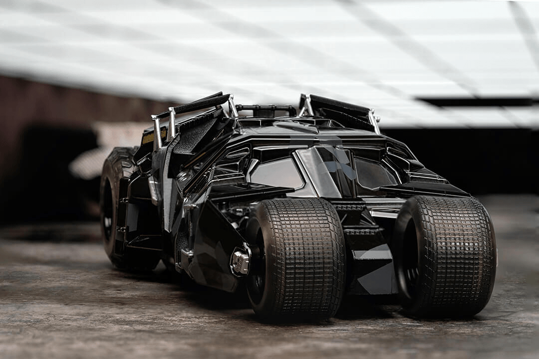 JAD34821 Batman: Dark Knight Trilogy - Batmobile with Batman (Black Camo) SDCC 2023 Exclusive 1:24 Scale - Jada Toys - Titan Pop Culture