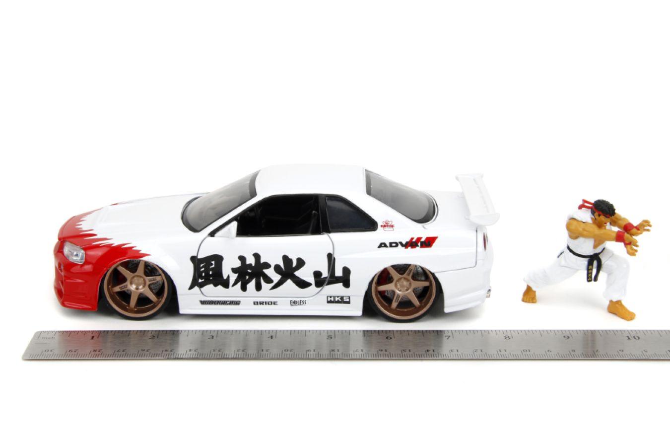 JAD35114 Street Fighter - Nissan Skyline GTR R34 (with Ryu figure) 1:24 Scale Diecast Vehicle Set - Jada Toys - Titan Pop Culture