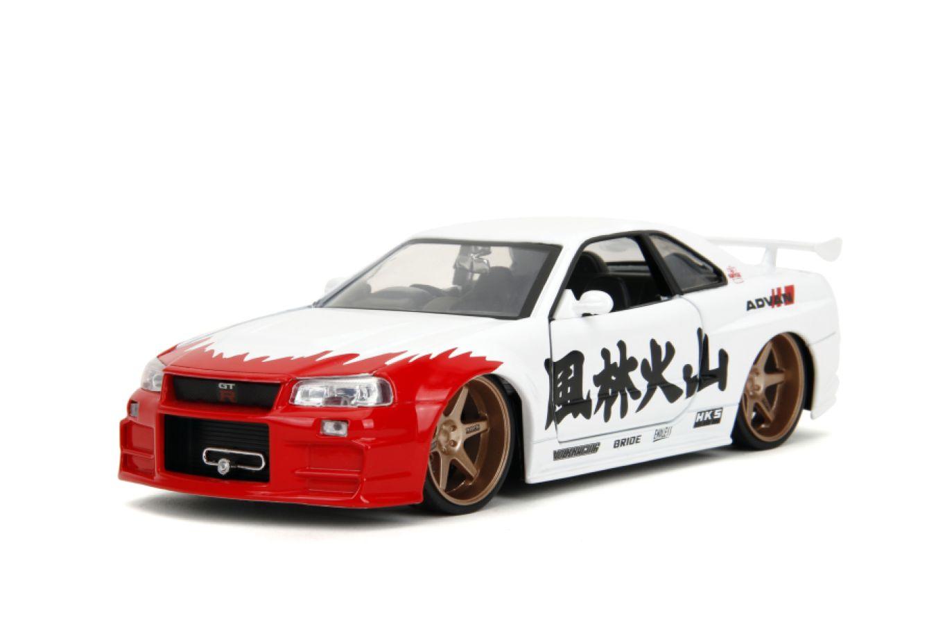 JAD35114 Street Fighter - Nissan Skyline GTR R34 (with Ryu figure) 1:24 Scale Diecast Vehicle Set - Jada Toys - Titan Pop Culture