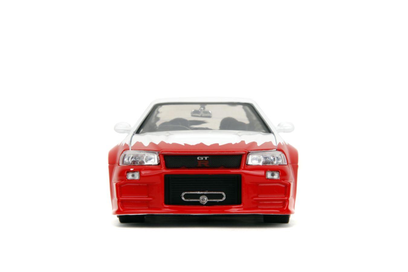 JAD35114 Street Fighter - Nissan Skyline GTR R34 (with Ryu figure) 1:24 Scale Diecast Vehicle Set - Jada Toys - Titan Pop Culture