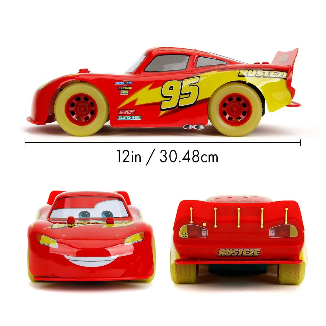 JAD35563 Cars - 1:14 Lightning Mcqueen (Glow) Remote Control Car - Jada Toys - Titan Pop Culture