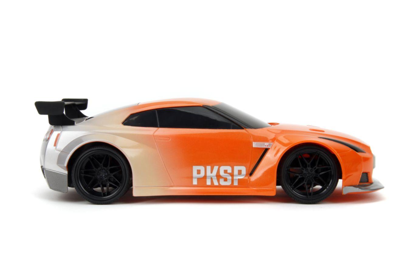 JAD35910 Pink Slips - 2009 Nissan Skyline GTR R35 1:16 Scale Remote Control Car - Jada Toys - Titan Pop Culture