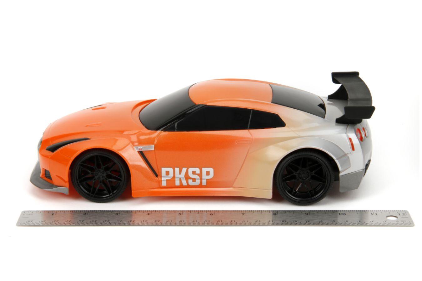 JAD35910 Pink Slips - 2009 Nissan Skyline GTR R35 1:16 Scale Remote Control Car - Jada Toys - Titan Pop Culture