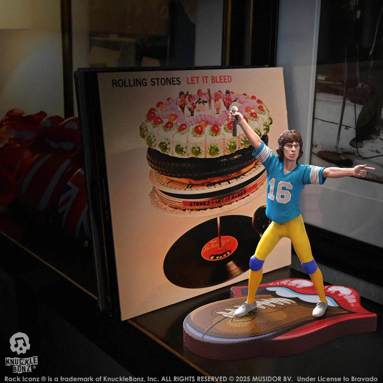 KNURSMJ81BL100 Rolling Stones - Mick Jagger Tour '81 (Blue Jersey) Statue - KnuckleBonz - Titan Pop Culture