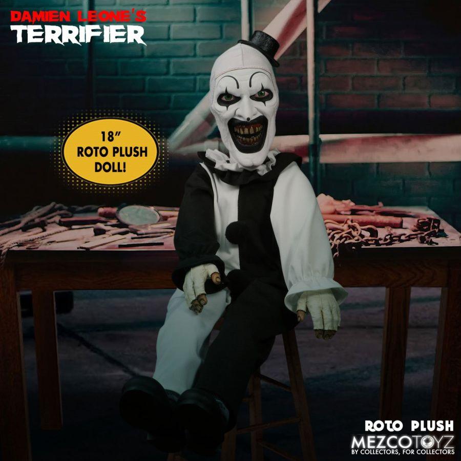 MEZ25526 Terrifier - Art The Clown 18'' Roto Plush - Mezco Toyz - Titan Pop Culture