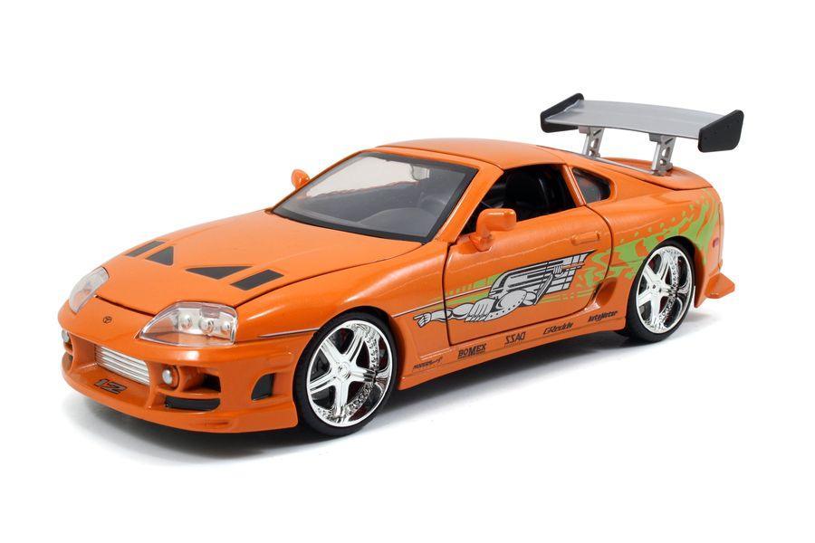 JAD30738 Fast and Furious - 1995 Toyota Supra 1:24 with Brian Hollywood Ride - Jada Toys - Titan Pop Culture